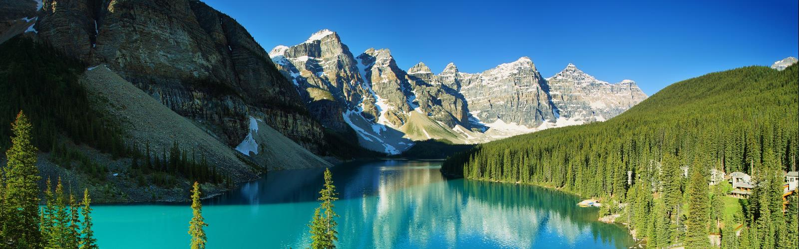 mountain outdoor sky water snow nature tree landscape lake glacial lake plant surrounded hillside