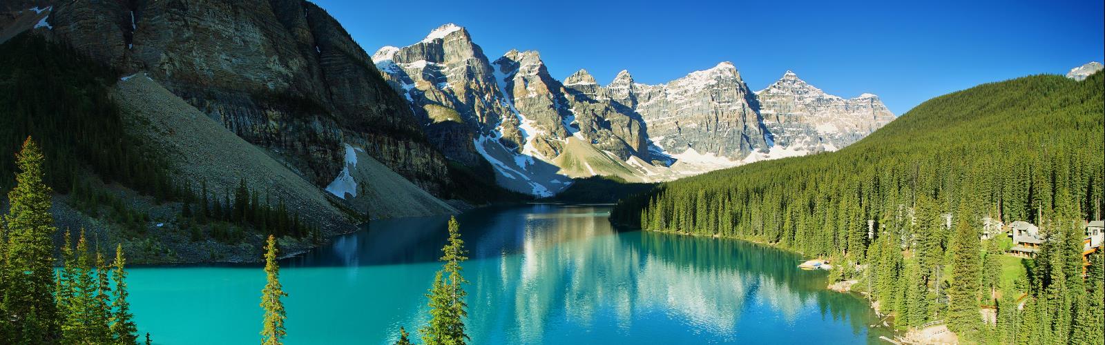 mountain outdoor water tree sky nature snow landscape lake glacial lake tarn wilderness surrounded