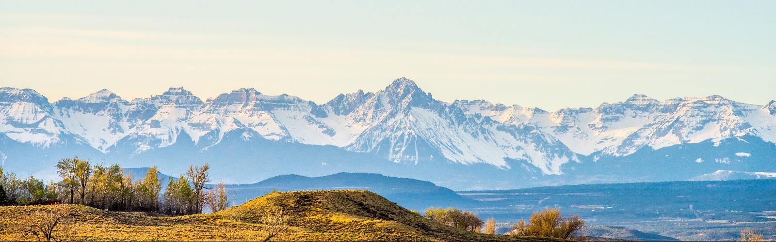 mountain sky outdoor nature snow landscape canyon valley background pasture distance highland
