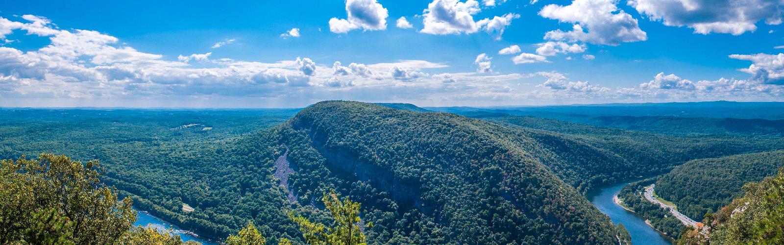 sky outdoor mountain nature cloud landscape water hill overlooking reef hillside clouds land lush highland