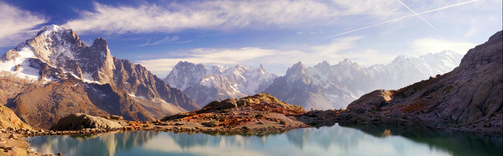 mountain sky outdoor nature valley canyon landscape cloud snow lake water background mountain range overlooking surrounded