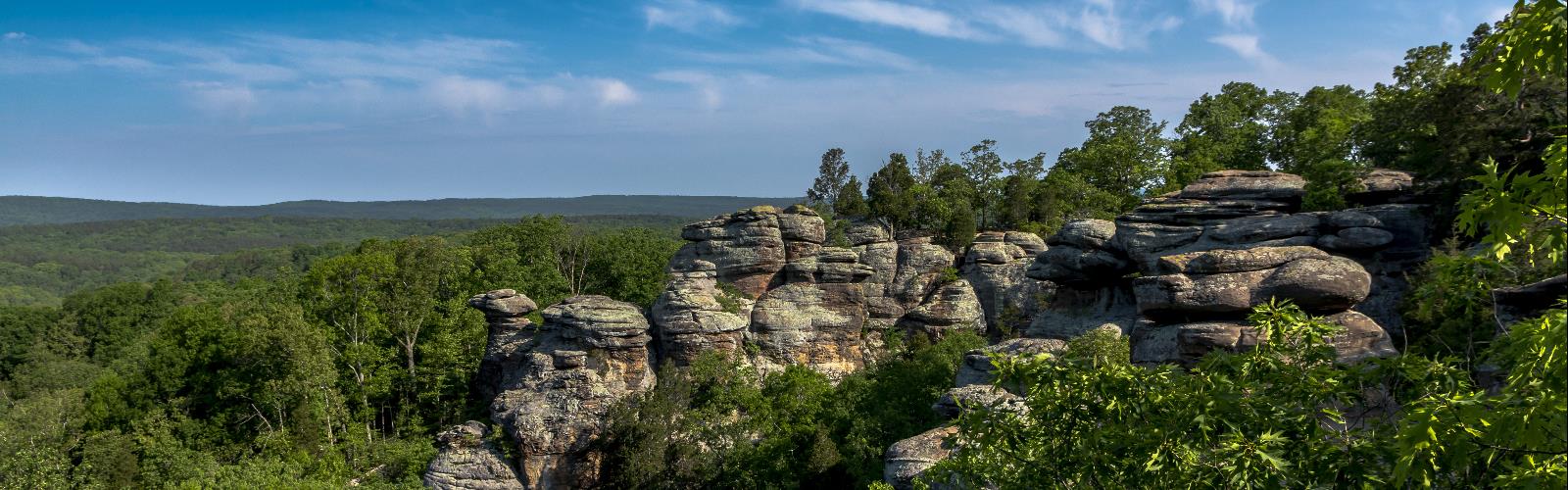 outdoor rock sky tree mountain landscape grass cloud rocky nature plant bedrock stone outcrop hillside
