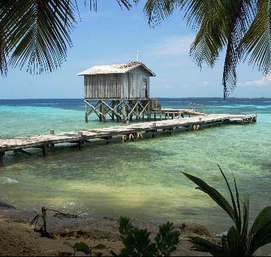 Belize  sky outdoor water beach lake wooden chair pier palm shore dock ocean overlooking lined resort several