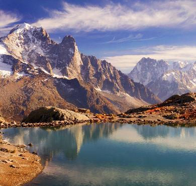 France  mountain sky outdoor nature valley canyon landscape cloud snow lake water background mountain range overlooking surrounded