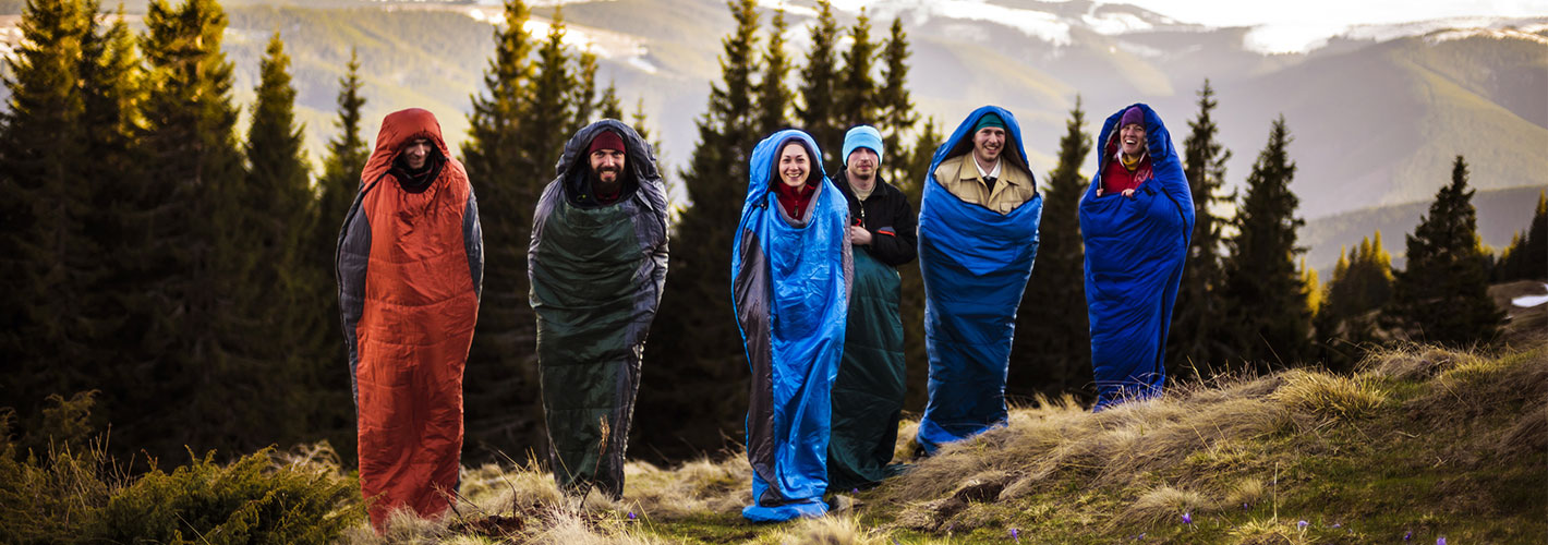 tree outdoor hiking grass person jacket smile clothing woman snow hiking equipment hay human face people slope animal